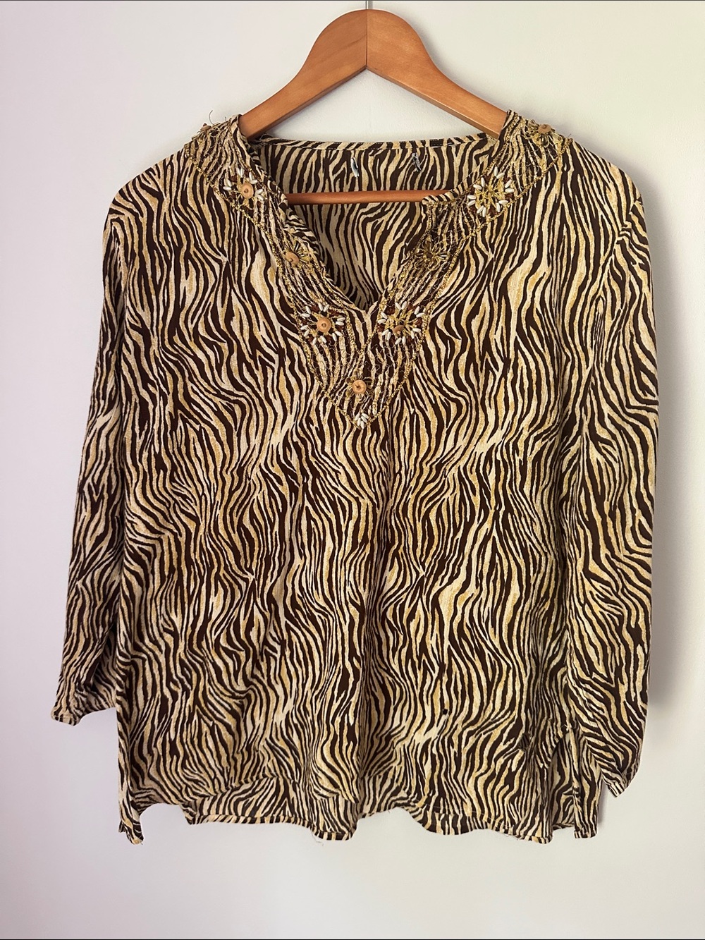 4/$20 Women’s Animal-Print V-Neck Tunic in Black and Cream